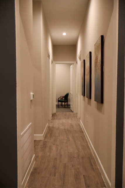 A clean hallway of a multi-tenant office building.